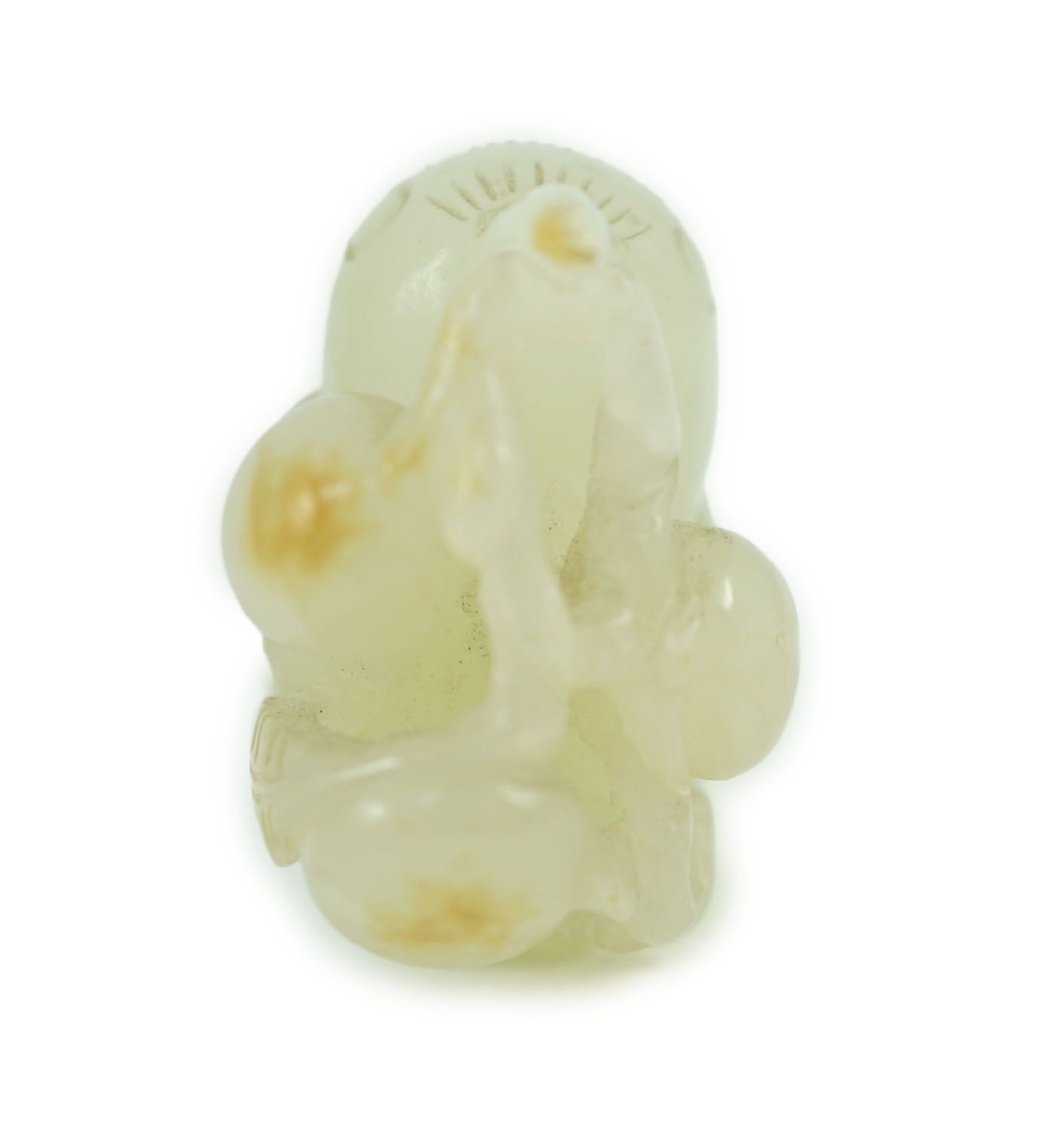 A Chinese pale celadon jade figure of a bird grasping a fruit sprig, 18th/19th century, 5.1 cm long